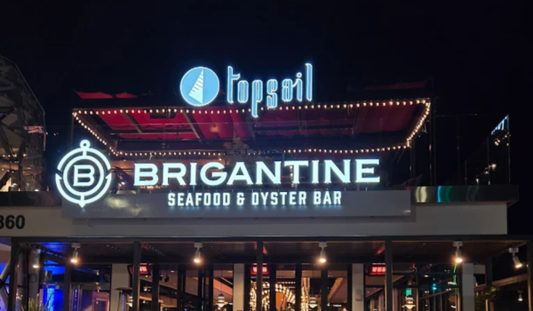 Harborfront view of Portside Pier, a popular waterfront destination among the best restaurants in San Diego for seafood and bay views.
